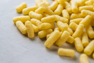 Background with milk corn sticks.