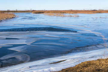 Melting ice. Spring ice drift on the river.