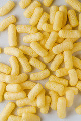 Background with milk corn sticks.