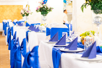 event room with decorated chairs