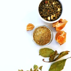 Dried medicinal herbs ingredients for medicinal tea, drink on a white background. Herbal treatment concept.Top view, close-up, copy space for text.