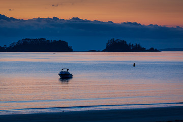 Sunset on at Martins bay New Zealand