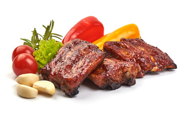 Delicious spicy marinated ribs in a bbq or tomato sauce, isolated on white background