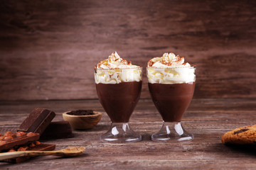 hot chocolate with cocoa and chocolate chip cookies and whipped cream