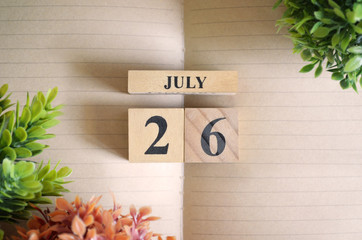 July 26, Appointment date with number cube design for background.