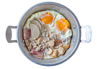 Fried egg on pan and served with pork. Fried egg with ham and sausage in pan.