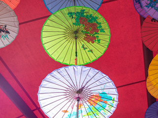 Colorful oil-paper umbrellas hanging in the air