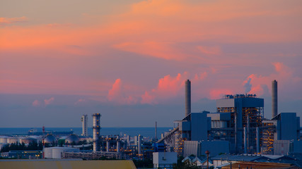 Coal power plant on sky sunset background