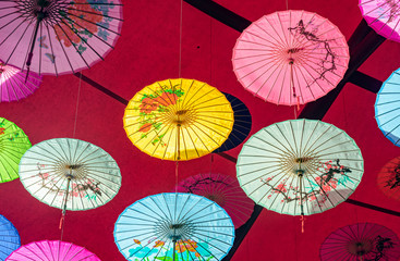 Colorful oil-paper umbrellas hanging in the air