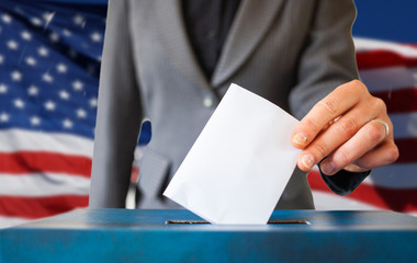 elections in the US - voting ballot and American flag