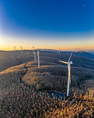 Aerial photos of a wind farm after sunrise
