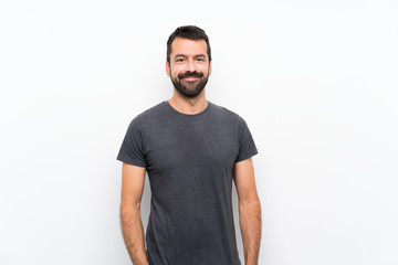 Young handsome man over isolated white background laughing