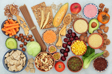 High fibre vegan health food with a large variety of foods high in antioxidants, omega 3, vitamins & protein with low GI levels for diabetics. Helps to lower blood pressure & cholesterol. Flat lay.