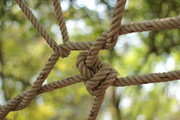 the brown rope wrap around the wood closeup for background