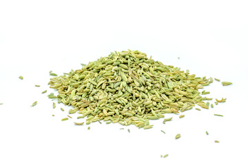 fennel seeds loose on a white background
