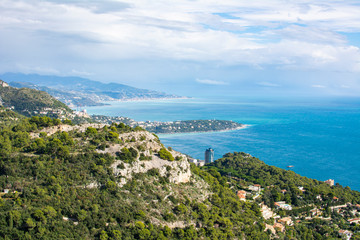 Fototapeta na wymiar View from La Turbie to Monaco, Cape Martin and Italy, stormy clouds and rain in Italy, La Turbie, France