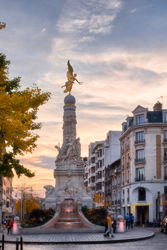 Beautiful sky and golden angel at Reims central Erlon square in city center, France