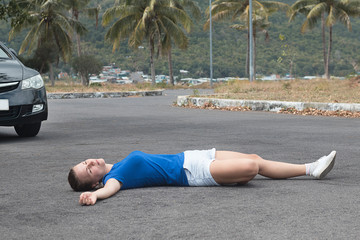 Unconscious girl, young female woman, dead fainted person fall, lying on the road, asphalt downed,...
