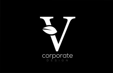 black and white V letter alphabet leaf logo icon design for company and business