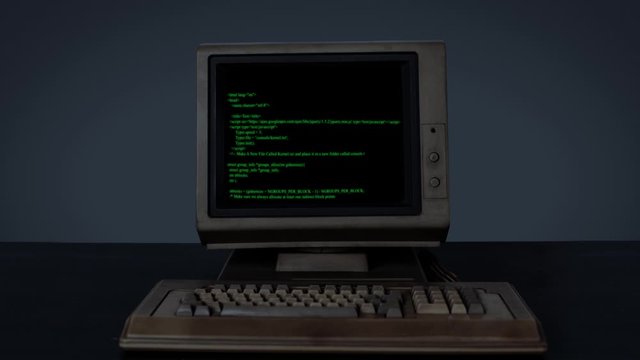 Antique monitor displays security hacking code data