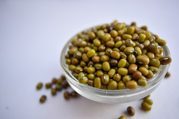 Mung Beans in A Glass Bowl on White Background Close-Up Stock Photograph Image