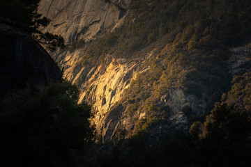 Fototapeta na wymiar Spots from Yosemite National Park' granite rock walls in California, United States.