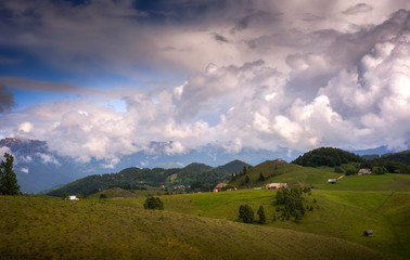 landscape with green field and blue sky