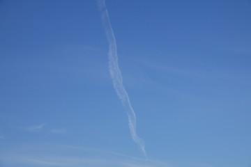 Python-shaped air trail after plane