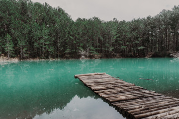 Fototapeta premium Beautiful turquoise lake in Crimea with the forest