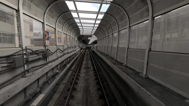 4k, Timelapse to real speed Effect automatic train moving through Taipei tunnels via guideway transit system. Metro moving forward crossing capital city. Asia tourism, transport technology concept-Dan
