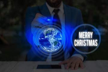Writing note showing Merry Christmas. Business concept for annual tradition to celebrate the birth...