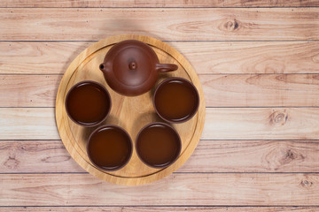 Traditional tea ceremony with clay tea set. Top view