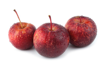 Three red little apples