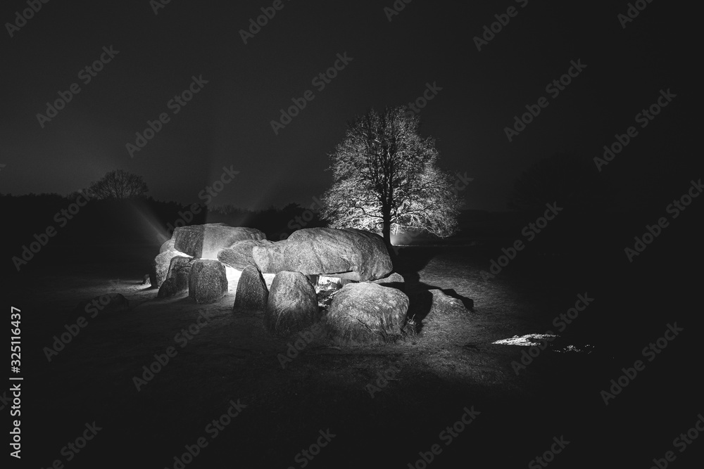 Wall mural Mystical prehistoric dolmens (hunebed) at night