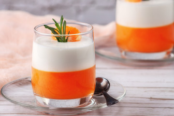 Panna Cotta with tangerines, jelly and rosemary, Italian dessert, home cooking. Copy space