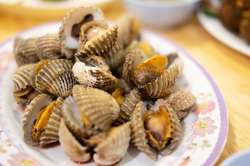 Close up cockle on a white plate