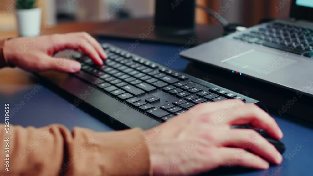 Poster close up of engineer hands typing on keyboard