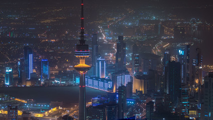 Top view of The Liberation Tower timelapse in Kuwait City illuminated at night. Kuwait, Middle East - obrazy, fototapety, plakaty
