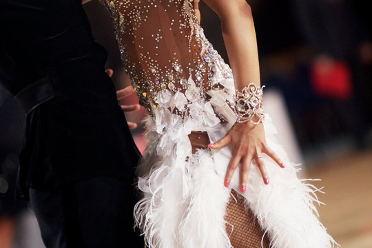Hands of latin ballroom dancer in a movement