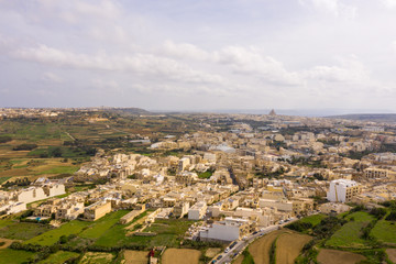 Fototapeta na wymiar Aerial top drone shot of rural landscape of the island of Gozo Malta
