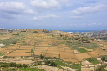 Aerial top drone shot of rural landscape of the island of Gozo Malta