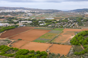 Aerial top drone shot of rural landscape of the island of Gozo Malta