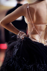 Latin ballroom dancer in a beautiful dress with crystals