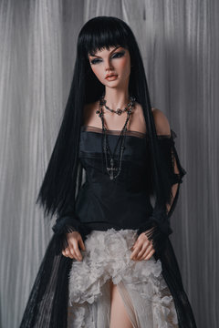  doll portrait in a long dress bgd