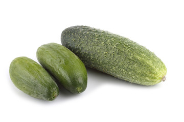 Three cucumbers isolated on white