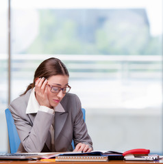 Fototapeta premium Sad businesswan in the office at work