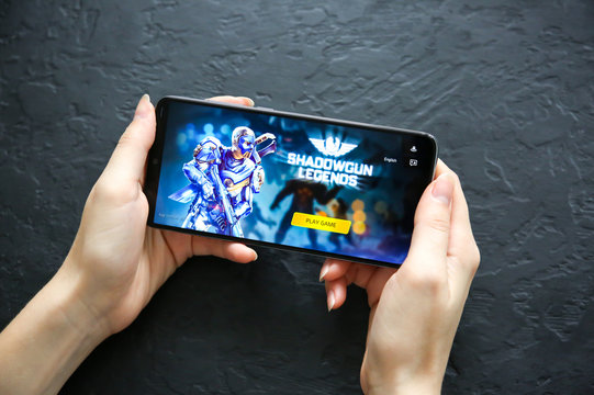 LVIV, UKRAINE - October 30, 2019 : Playing mobile game Shadowgun legends on modern smartphone Xiaomi Redmi Note 8 Pro powered by Mediatek Helio G90T processor