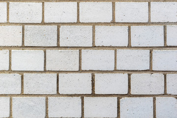 Oberfläche weißer Kalksandsteine einer Außenwand