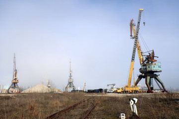 Fototapeta na wymiar Repair of the port crane. Ukraine, Cherkasy.