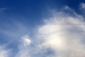 Naklejka na ściany i meble Feather clouds background